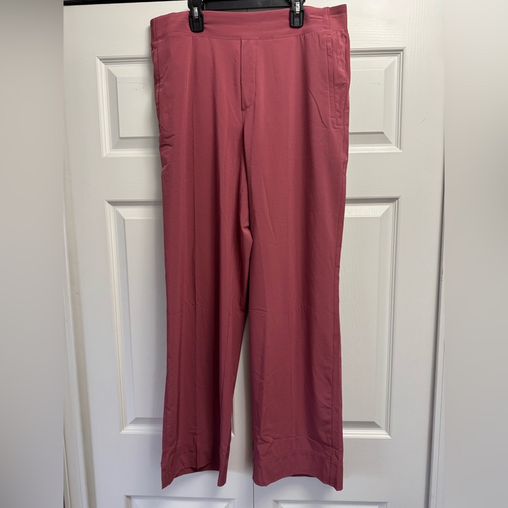 Athleta pink pants with zippered pockets. Size 14. Elastic comfy waistband.